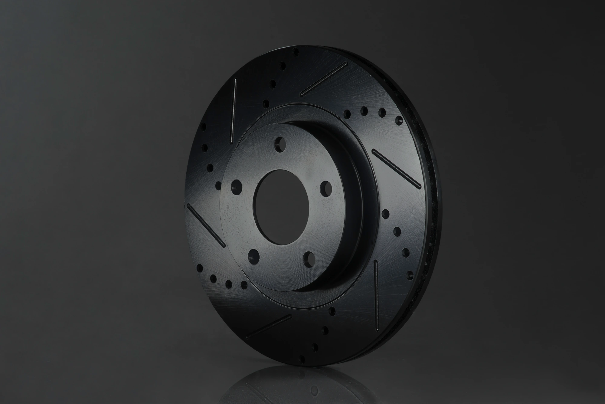 Close-up product photo of performance brake components for an automotive campaign