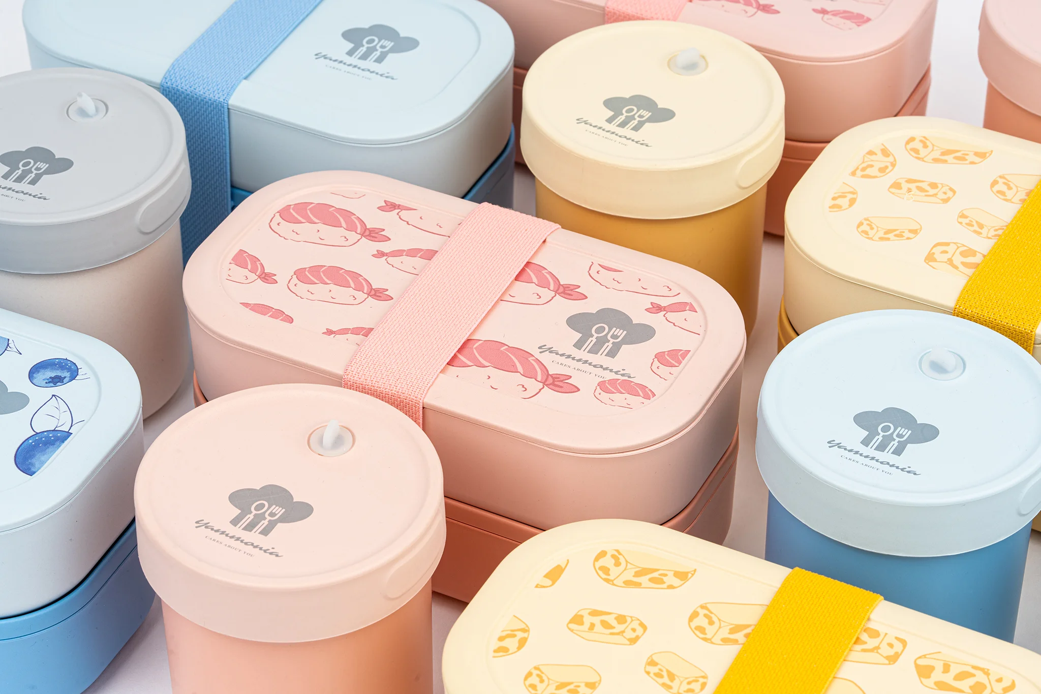 Colorful lunchbox and container products arranged in a clean grid, ideal for e-commerce ad creative
