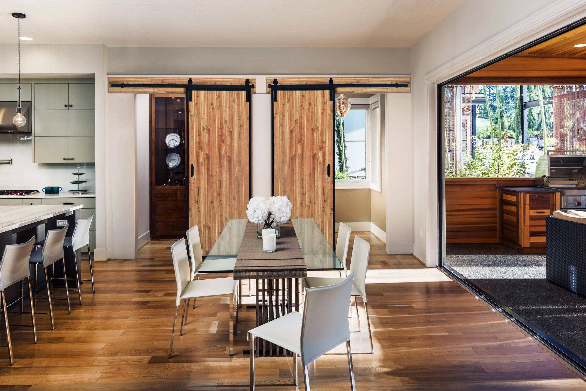 Modern interior space with natural wood doors, representing a home or architecture site